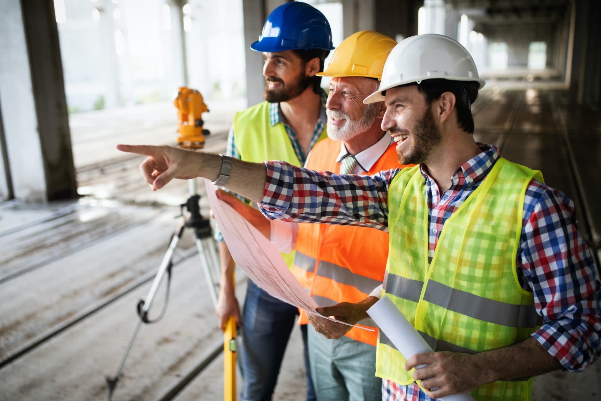 construction-engineer-with-foreman-worker-checking-construction-site